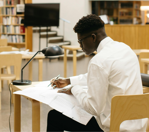 hispanic-man-working-in-an-architect-s-office-2023-11-27-05-09-53-utc (3)